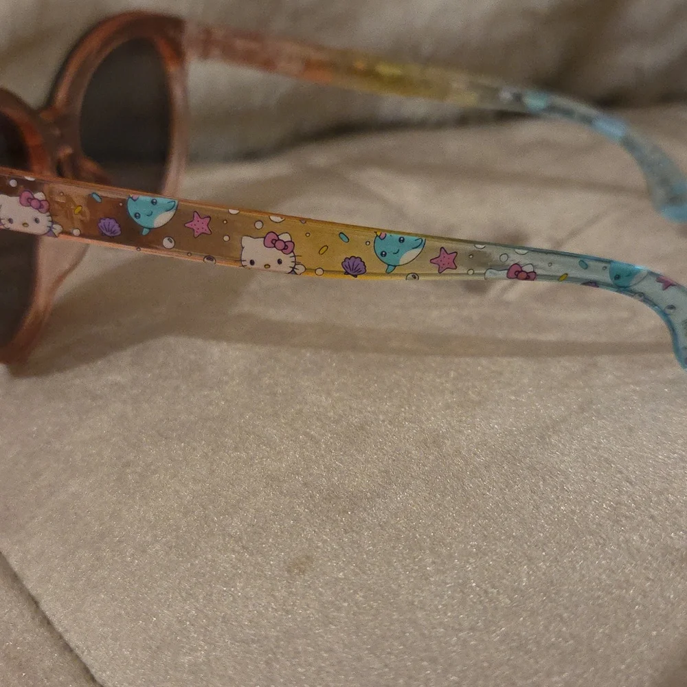 Hello Kitty Stylish Multicolor Sunglasses With HK Bow On Corner Emblem